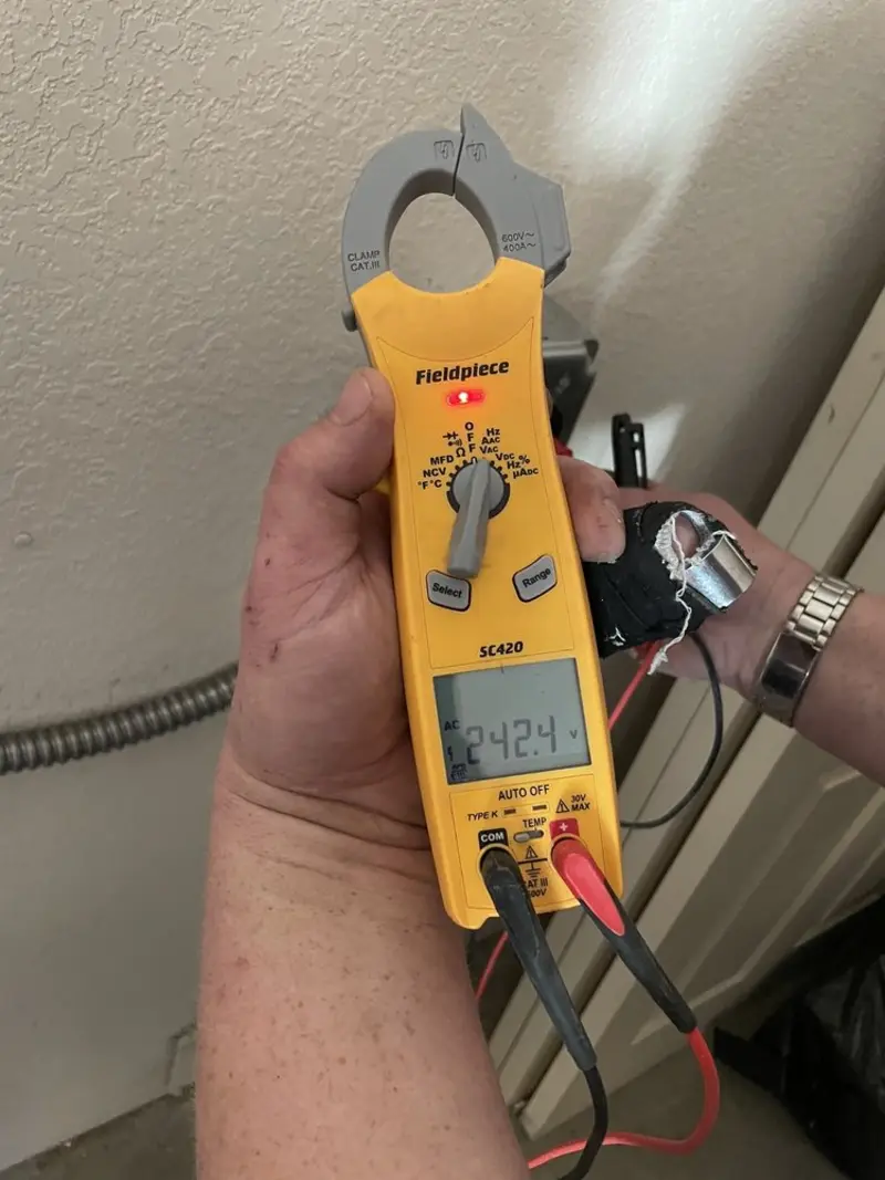 Voltage testing with clamp meter during Hot Tub / Pool Electrical Wiring in Godfrey